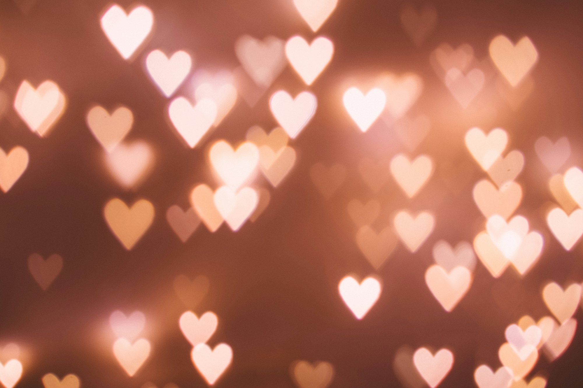 Warm heart-shaped bokeh lights